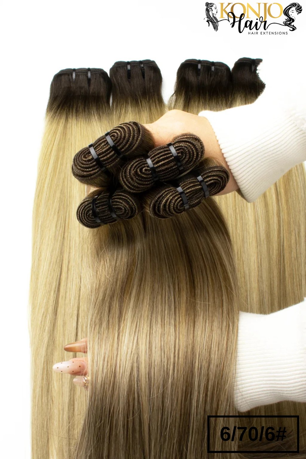 6/70/6 straight human hair bundles held in hand showing thickness and color blend