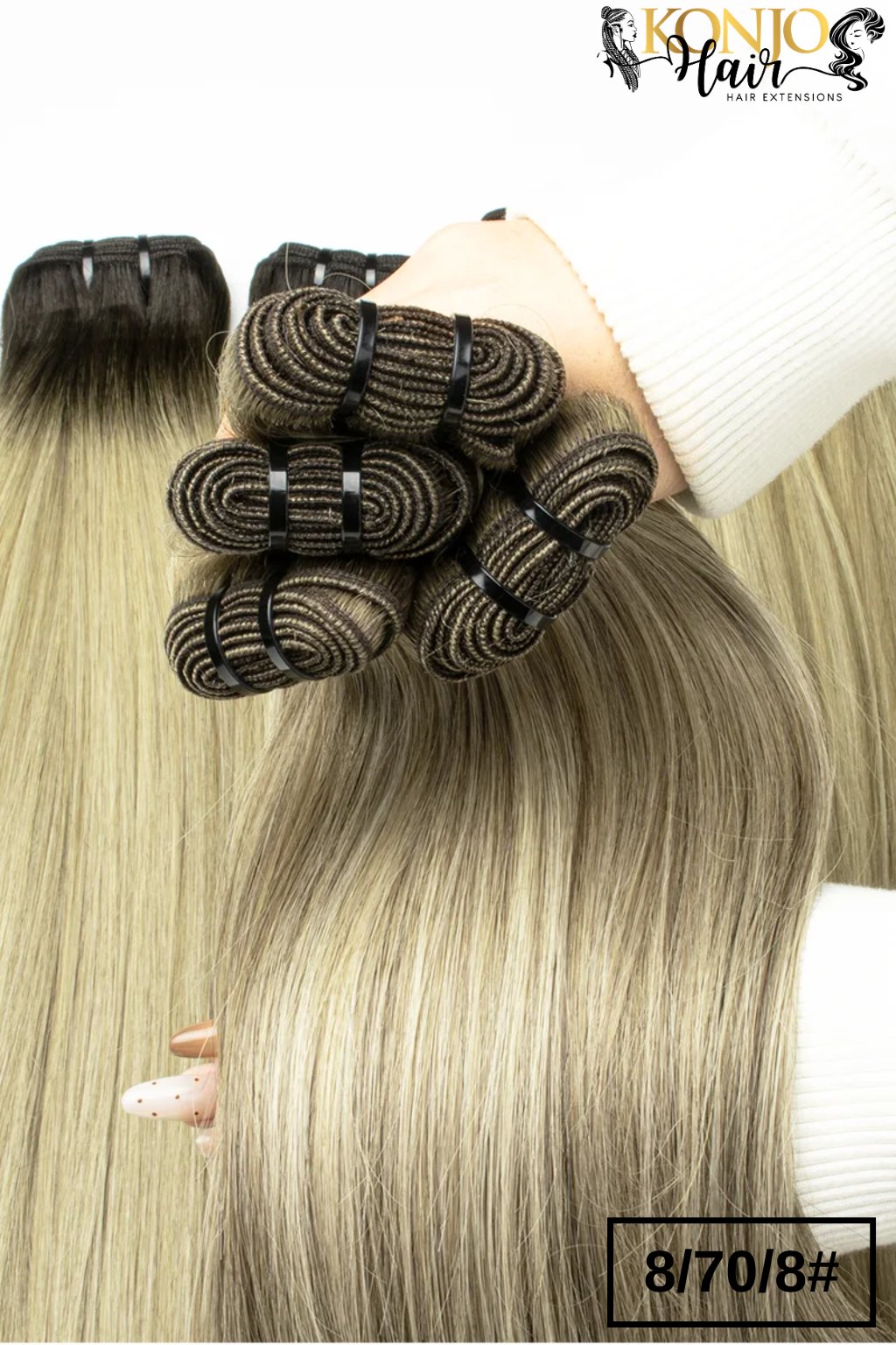 8/70/8 straight human hair bundles held in hand showing thickness and color blend